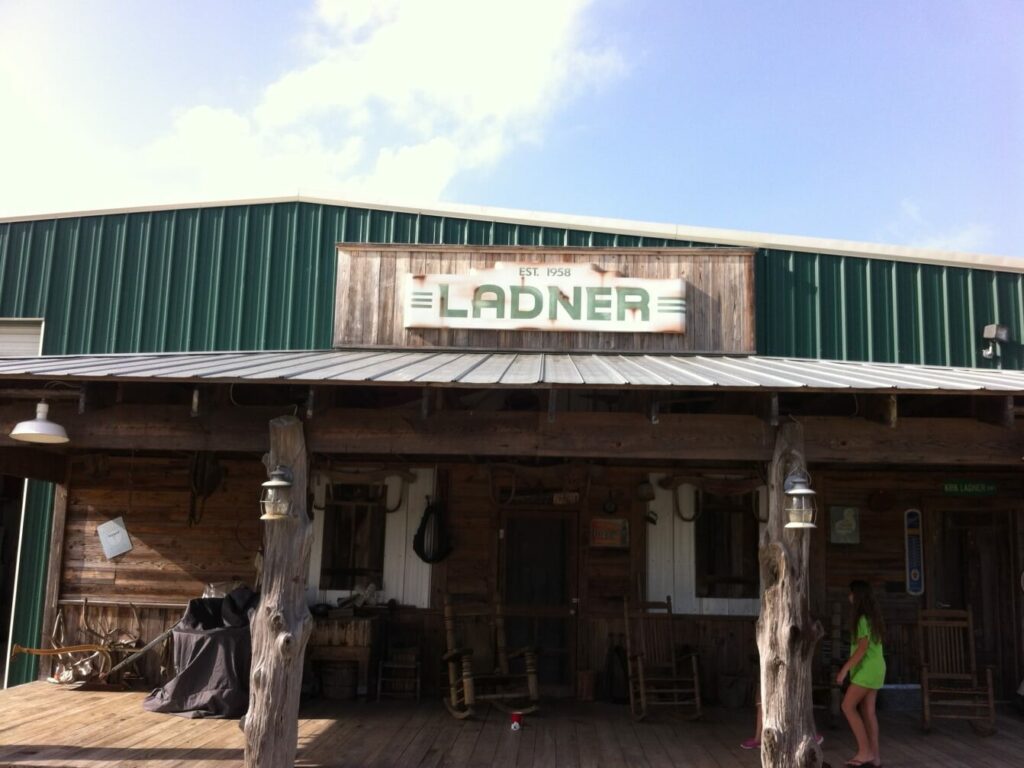 Ron Corder Customs A wooden building with a sign that says the ladderer.