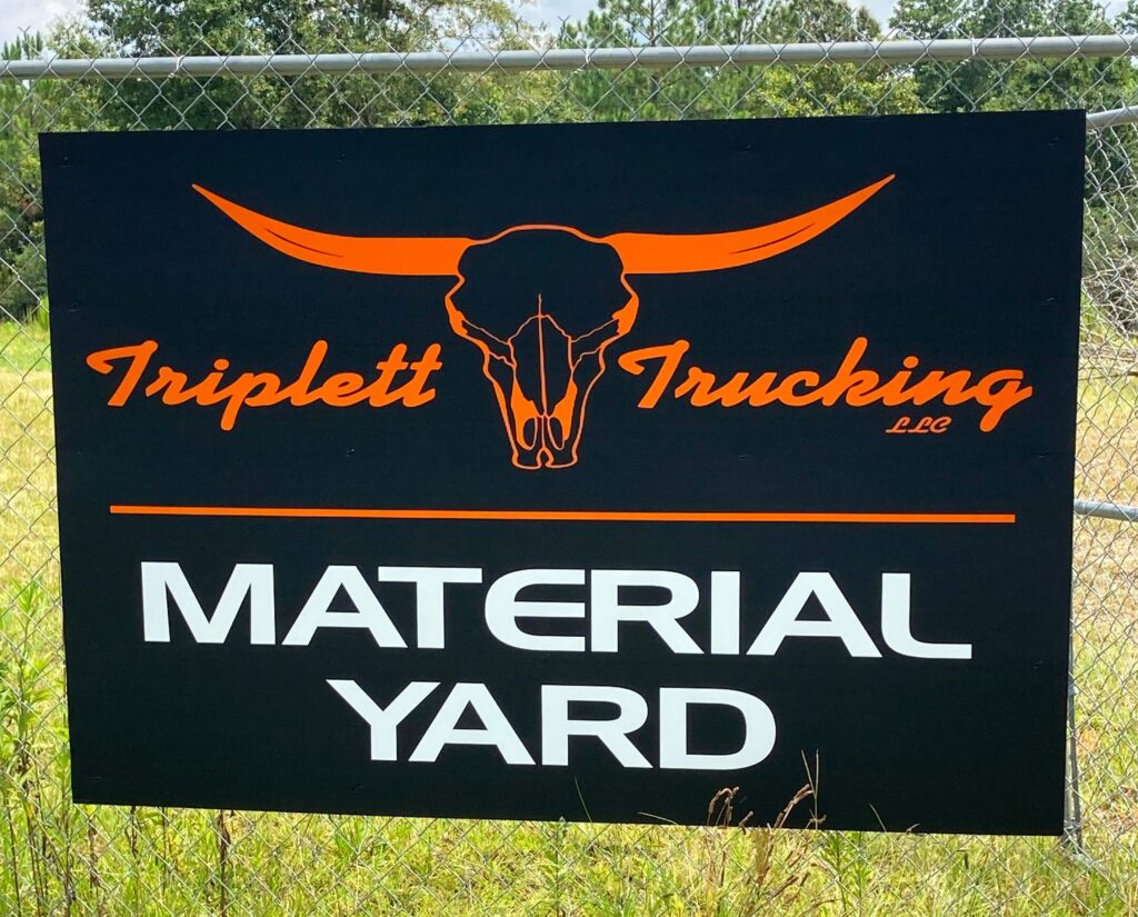 Ron Corder Customs Triplet trucking material yard sign.