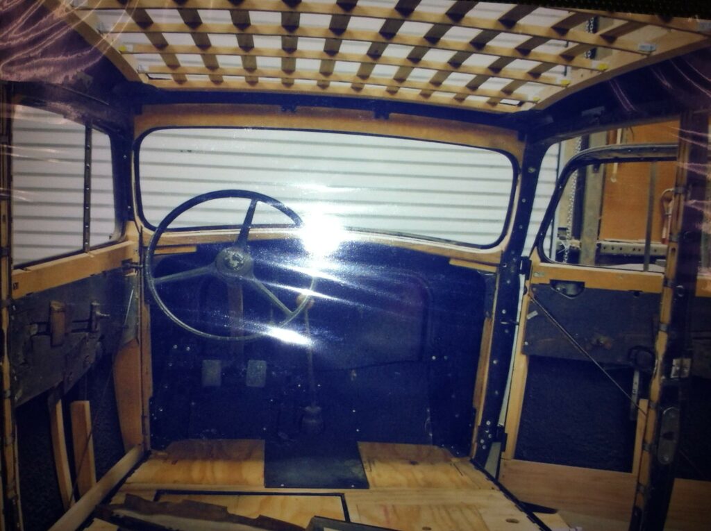 Ron Corder Customs The interior of a truck with a steering wheel and steering wheel.