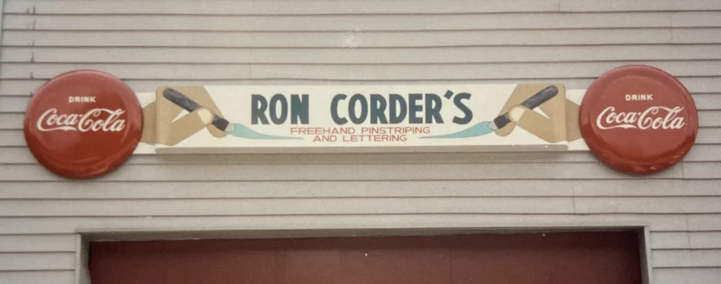 Ron Corder Customs A sign that says ron corder's on the side of a building.